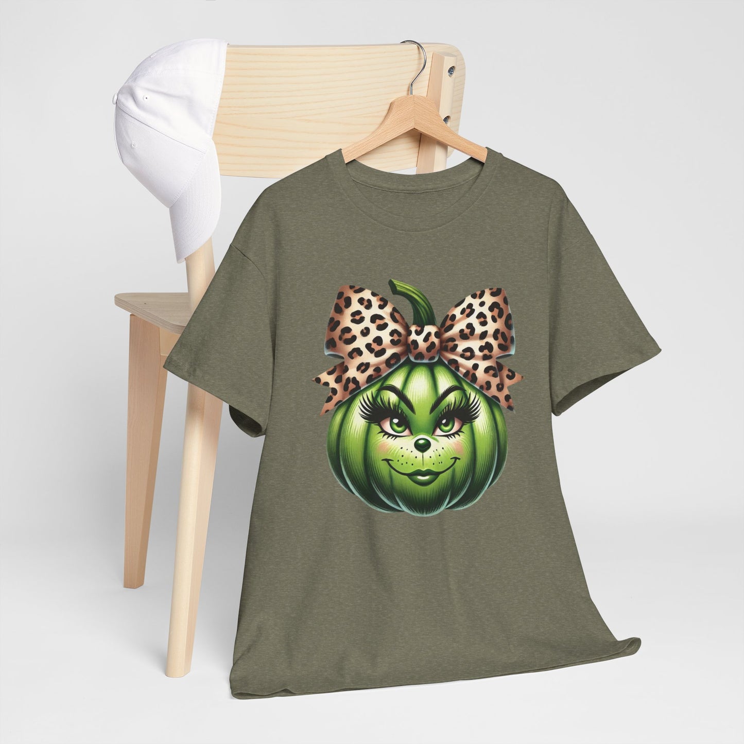 Unisex Heavy Cotton Tee - Feminine Grinch-like Pumpkin with Large Cheetah Print Bow Design